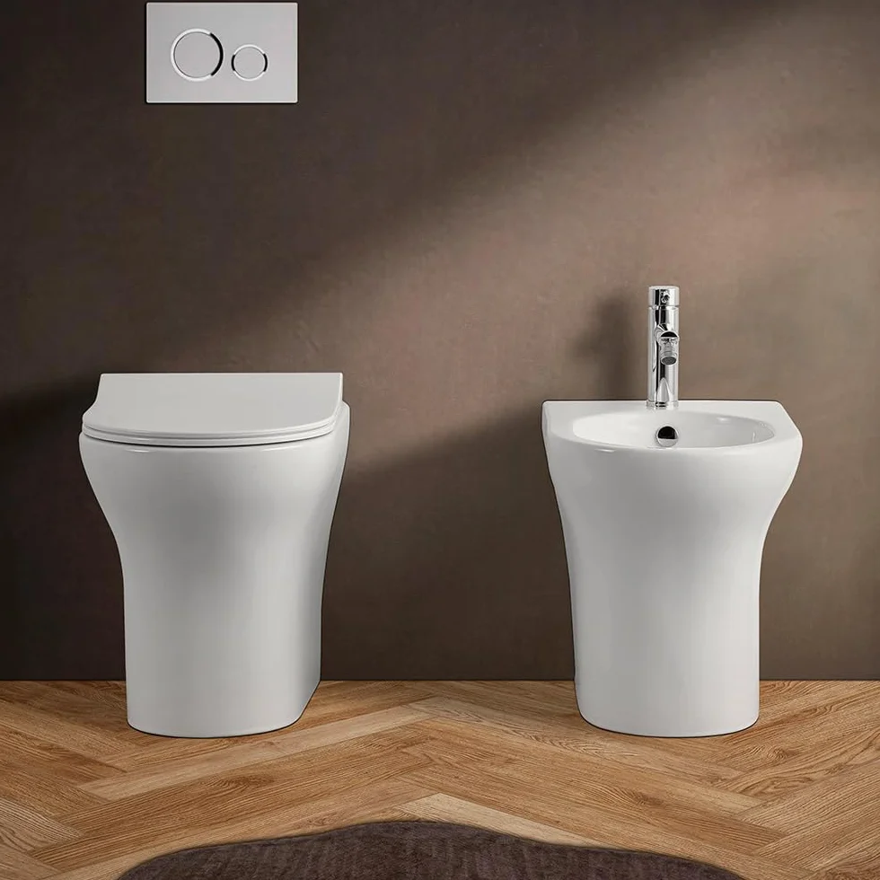Wc singolo filomuro bianco lucido senza brida, scarico universale a parete o a pavimento, fissaggi inclusi, ITACA