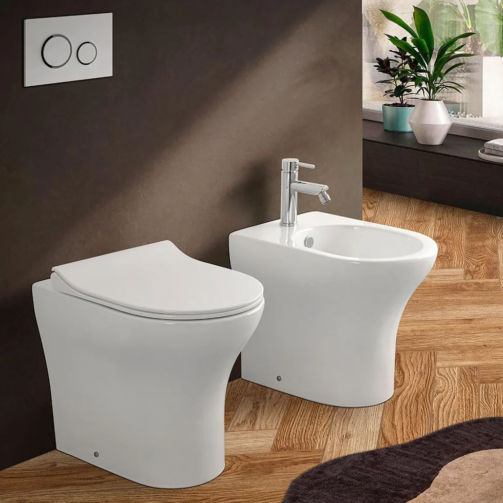 Wc singolo filomuro bianco lucido senza brida, scarico universale a parete o a pavimento, fissaggi inclusi, ITACA