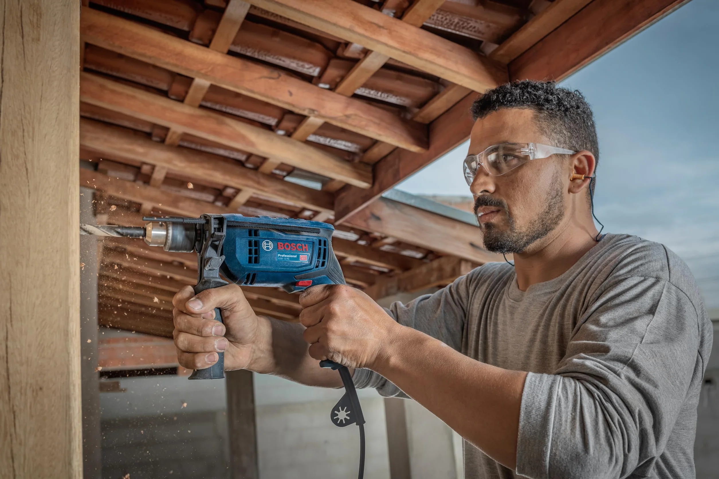 Bosch Professional Trapano con percussione GSB 13 RE (Motore da 600 Watt, incl. asta di profondità 210 mm, mandrino autoserrante 13 mm)