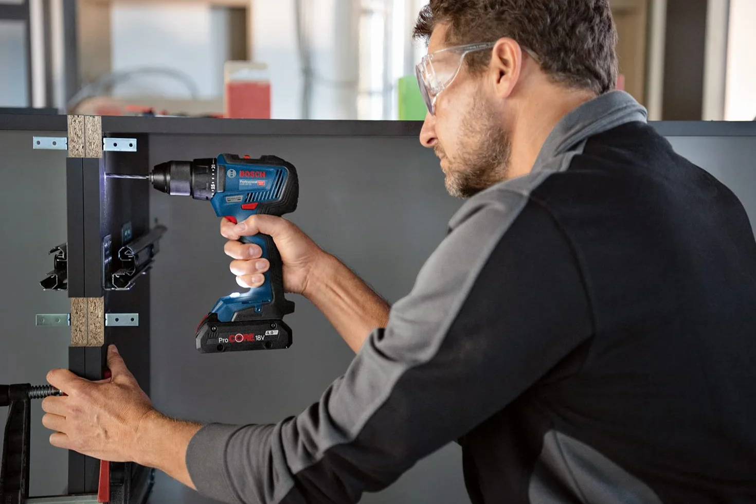 Bosch Professional Combo Kit GSR 18V-55 + GWS 18V-7 + GBH 18V-22 (incl. 2 batterie ProCORE 4.0Ah, caricabatteria GAL 18V-40, in borsa per gli attrezzi media)