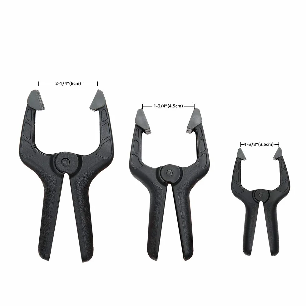 Amazon Basics confezione da 14 morsetti a molla in nylon: 6 unità da 8,57 cm, 4 unità da 11,43 cm, 4 unità da 16,51 cm, Nero/ Grigio